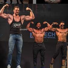 The Towering Triumph: Exploring the World of the Tallest Bodybuilder
